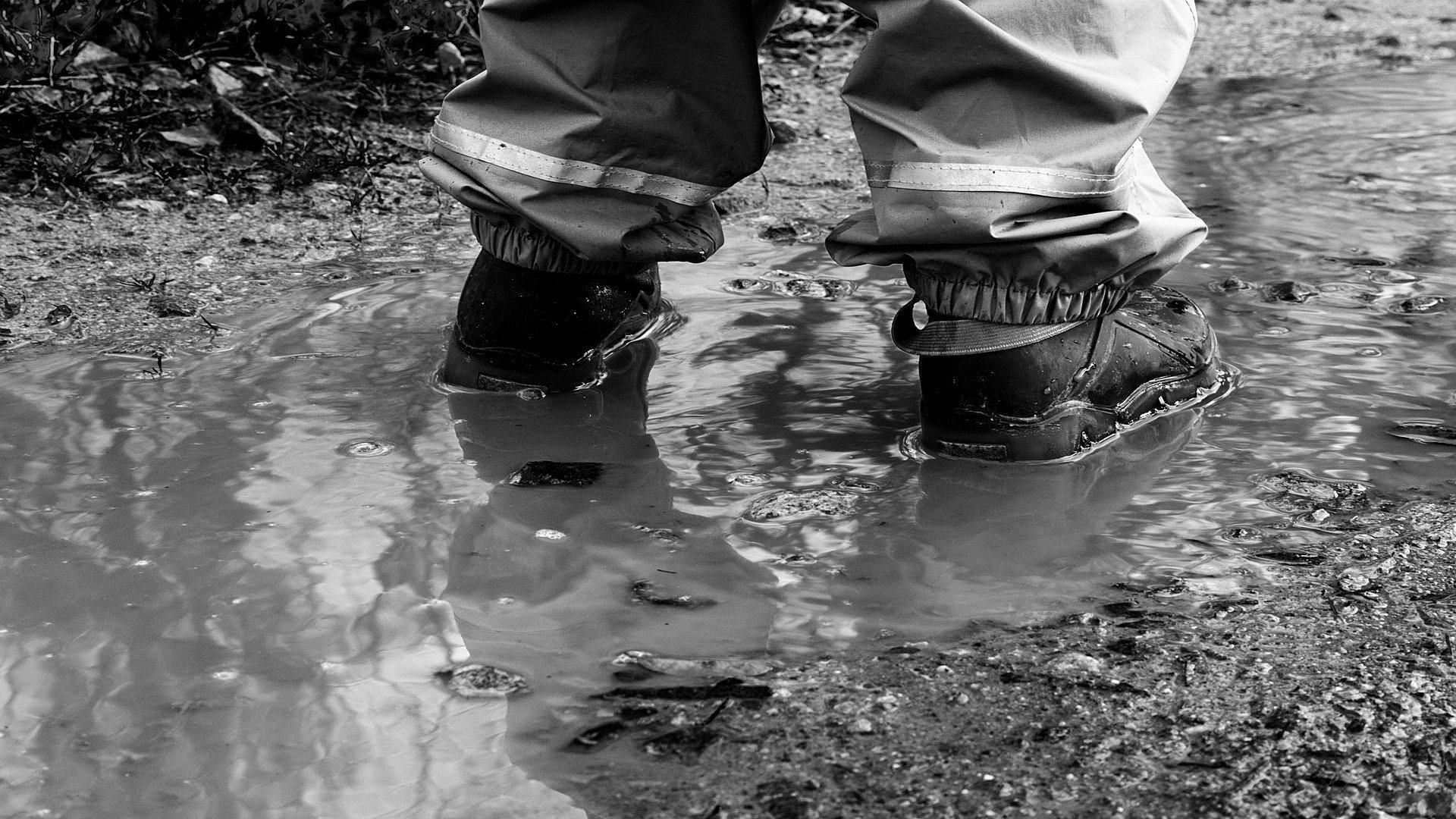 Les boots de pluie faites les craquer